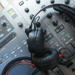 DJ Mixer with headphones.